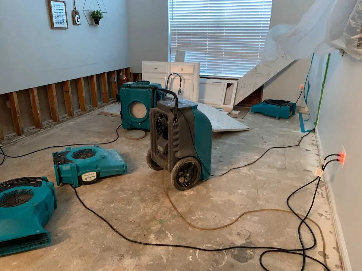 Dehumidifier in flood-cut room for Water Damage Restoration in Rockport